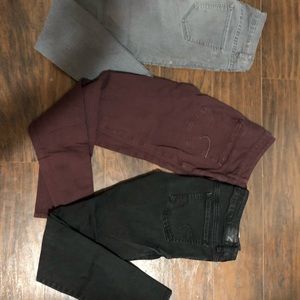 Skinny jean lot 3 jeans black grey and purple.